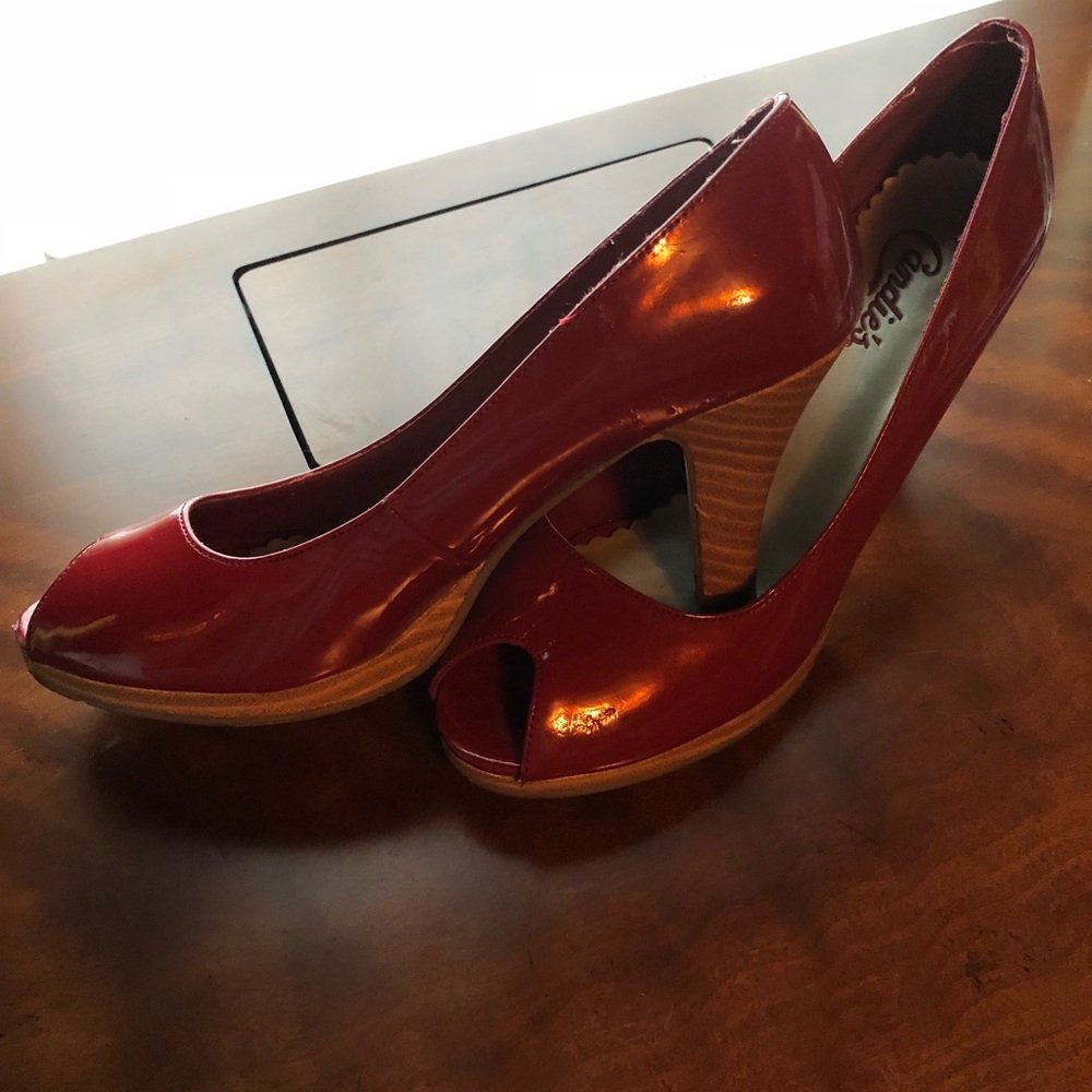 Fire Engine red, peekaboo toe, patent leather.